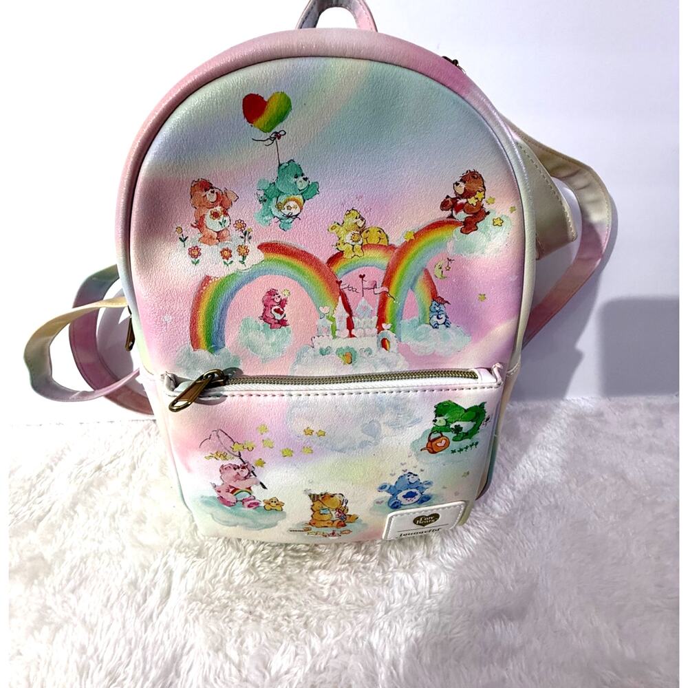 Loungefly Care Bears Rainbow Mini Backpack Pre-loved Gently used inside.
